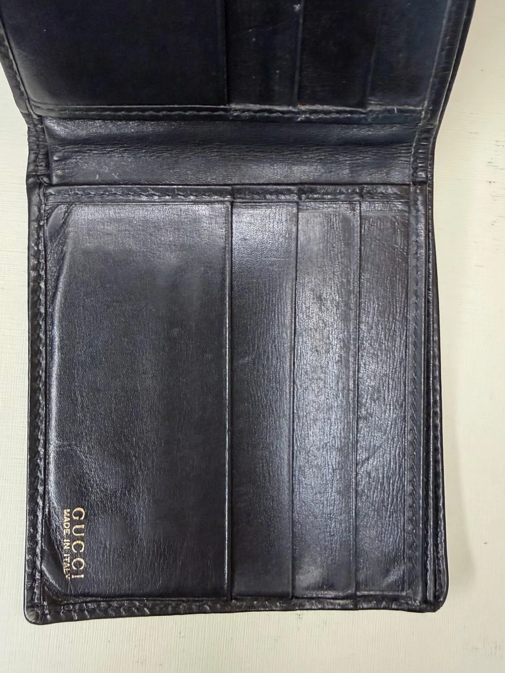 Gucci Black Leather Wallet with Gold Corner Accents